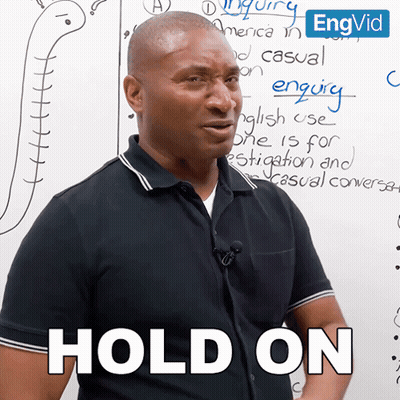 A Man Stands In Front Of A White Board That Says " Hold On " On It GIF