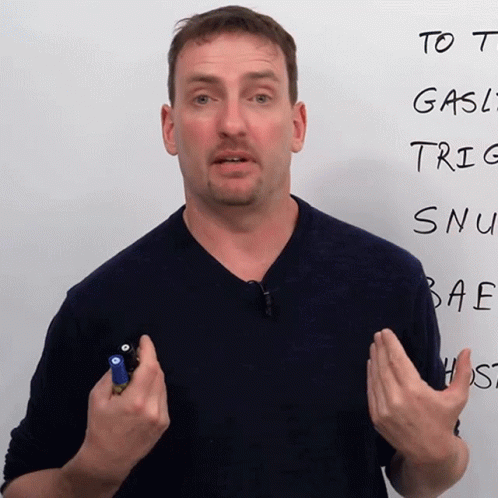 A Man Stands In Front Of A White Board That Says To T Gas Trig Snu Bae Etc. GIF