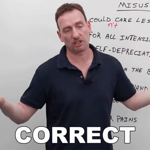 A Man Stands In Front Of A White Board With The Words Correct Written On It GIF