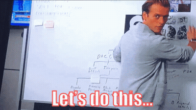 A Man Stands In Front Of A White Board With The Words Let 'S Do This GIF