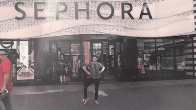 A Man Stands In Front Of The Sephora Store GIF