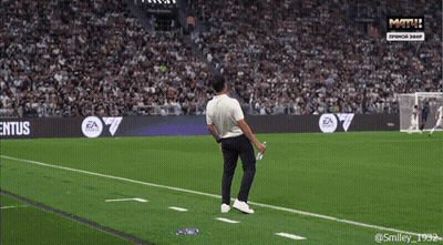 A Man Stands On A Soccer Field With A Banner That Says Il Club E Tuo GIF