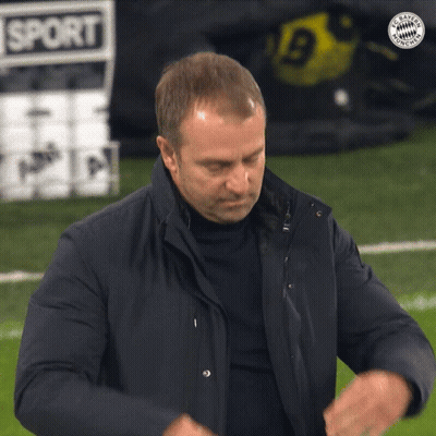 A Man Stands On A Soccer Field With A Sign That Says Sport On It GIF