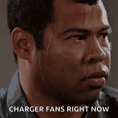 A Man Sweating With The Words " Charger Fans Right Now " On His Face GIF