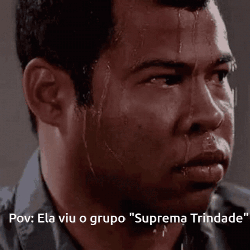 A Man Sweating With The Words " Suprema Trindade " Written Below Him GIF