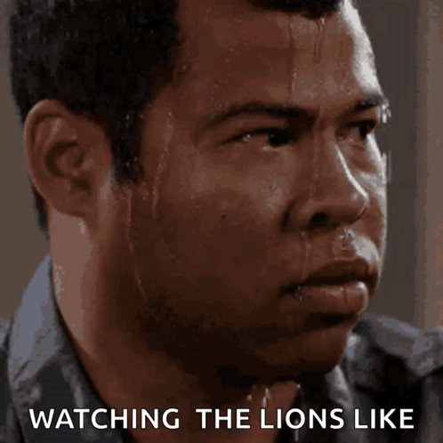 A Man Sweating With The Words Watching The Lions Like Behind Him GIF
