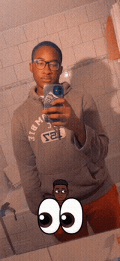 A Man Taking A Picture Of Himself In A Mirror Wearing A Hoodie That Says Abercrombie & Fitch GIF