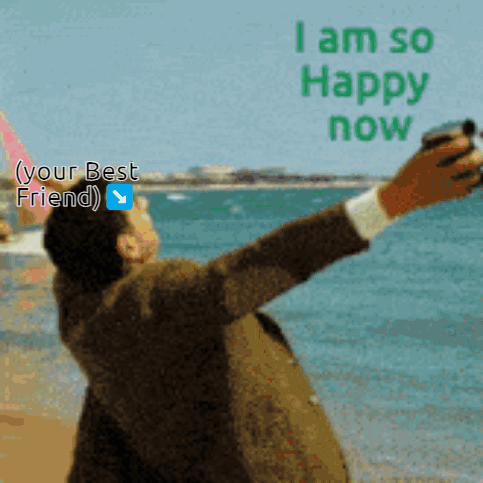 A Man Taking A Picture Of Himself On The Beach With The Words I Am So Happy Now Above Him GIF