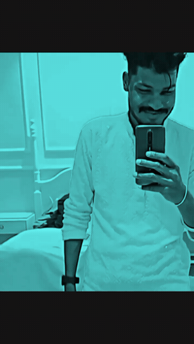 A Man Taking A Picture Of Himself With Wah Wah Ji Wah Written Above Him GIF