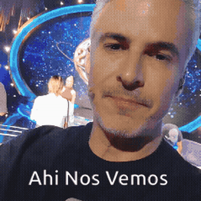A Man Taking A Selfie With The Words " Ahi Nos Vemos " Behind Him GIF