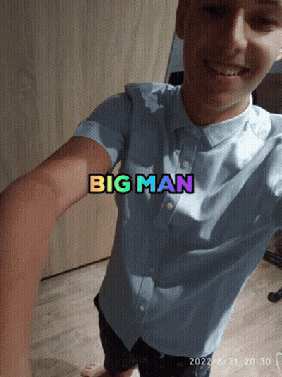 A Man Taking A Selfie With The Words Big Man Written On His Shirt GIF