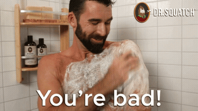 A Man Taking A Shower With The Words You 'Re Bad Written On The Bottom GIF