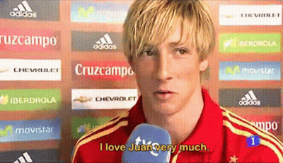 A Man Talking Into A Microphone With The Words I Love Juan Very Much GIF