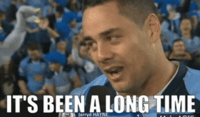 A Man Talking Into A Microphone With The Words " It 'S Been A Long Time " Below Him GIF