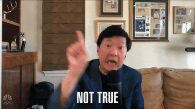 A Man Talking Into A Microphone With The Words Not True Written On The Screen GIF