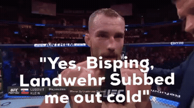 A Man Talking Into A Microphone With The Words " Yes Bisping Landwehr Subbed Me Out Cold " Above Him GIF