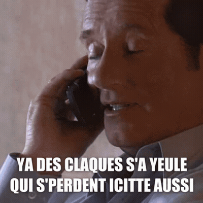 A Man Talking On A Cell Phone With A Caption That Says Ya Des Claques S ' A Yeule GIF