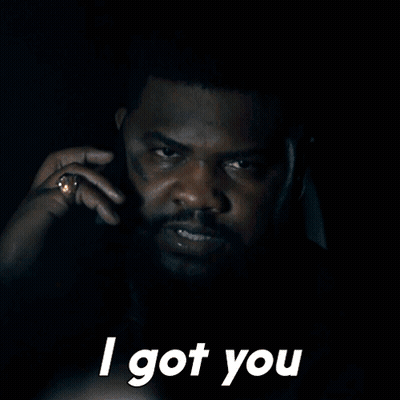 A Man Talking On A Cell Phone With The Words " I Got You " Above Him GIF