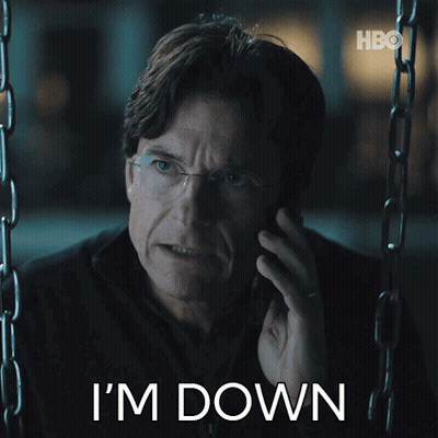 A Man Talking On A Cell Phone With The Words " I 'M Down " Next To Him GIF