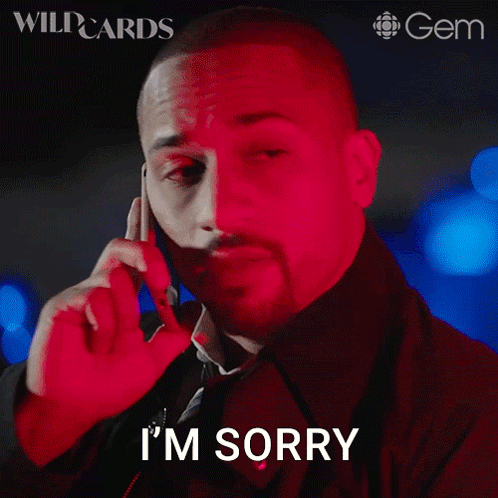 A Man Talking On A Cell Phone With The Words I 'M Sorry On His Face GIF