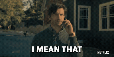 A Man Talking On A Cell Phone With The Words " I Mean That " Above Him GIF