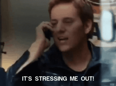 A Man Talking On A Cell Phone With The Words It 'S Stressing Me Out GIF