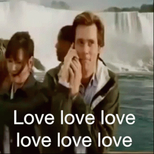 A Man Talking On A Cell Phone With The Words Love Love Love Love Love Love GIF