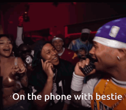 a man talking on a cell phone with the words on the phone with bestie above him