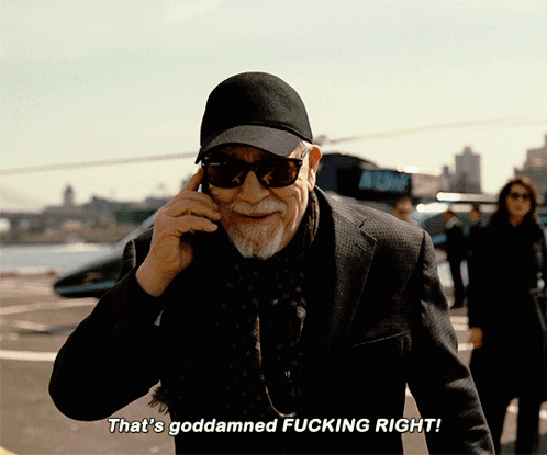 A Man Talking On A Cell Phone With The Words That 'S Goddamned Fucking Right Below Him GIF