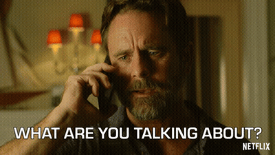 A Man Talking On A Cell Phone With The Words What Are You Talking About Written Below Him GIF