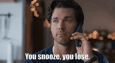 A Man Talking On A Cell Phone With The Words You Snooze You Lose GIF