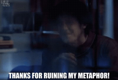 A Man Talking On A Phone With The Words " Thanks For Ruining My Metaphor " Written Below Him GIF