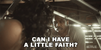 A Man Talking To A Woman With The Words " Can I Have A Little Faith " Above Him GIF