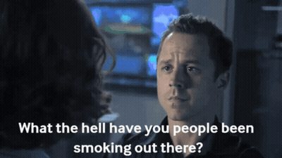 A Man Talking To A Woman With The Words " What The Hell Have You People Been Smoking Out There " Below Him GIF