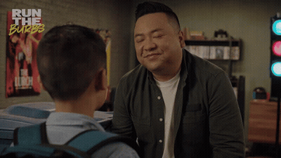A Man Talking To A Young Boy With The Words " Life Is Hard " On The Bottom GIF