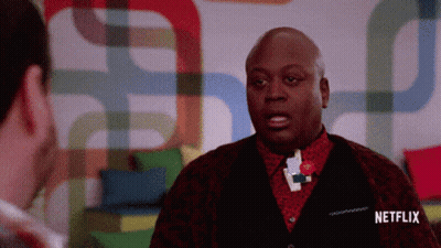 A Man Talking To Another Man With A Netflix Logo On The Bottom GIF