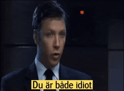 A Man Talking To Another Man With A Yellow Sign That Says Och Juvenil Full GIF