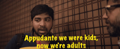 A Man Talking To Another Man With The Words " Appudante We Were Kids Now We 'Re Adults " On The Bottom GIF