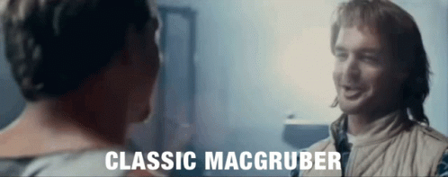 A Man Talking To Another Man With The Words Classic Macgruber Written On The Bottom GIF