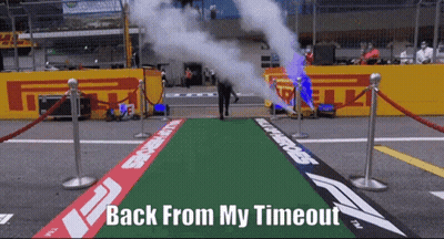 A Man Walking Down A Green Carpet With The Words Back From My Timeout On It GIF