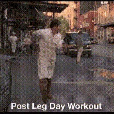 A Man Walking Down A Street With The Words Post Leg Day Workout GIF
