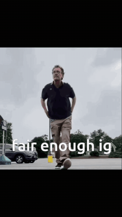 A Man Walking In A Parking Lot With The Words Fair Enough Ig Written On The Bottom GIF