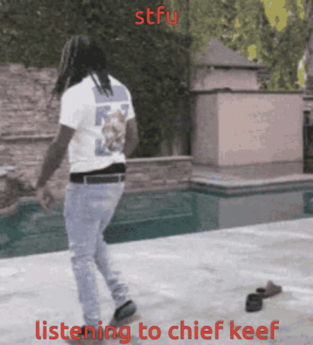 A Man Walking In Front Of A Pool With The Words Listening To Chief Keef GIF