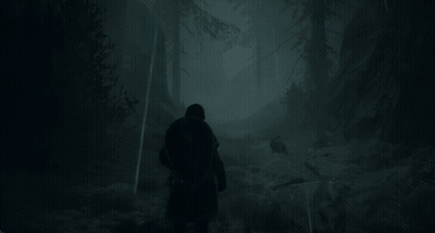 A Man Walking Through A Foggy Forest With A Backpack GIF
