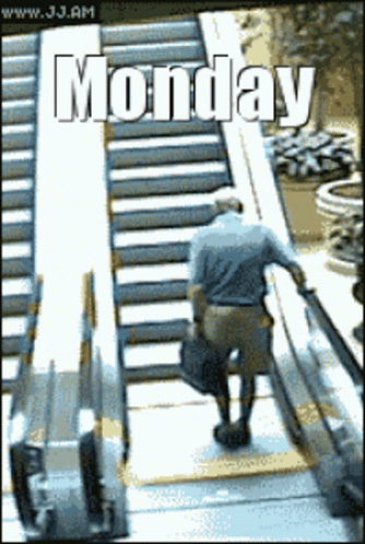 A Man Walking Up An Escalator With The Word Monday On The Bottom GIF