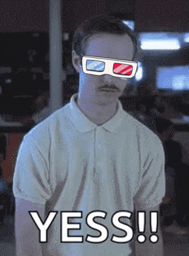 A Man Wearing 3D Glasses Has The Word Yess Written Below Him GIF