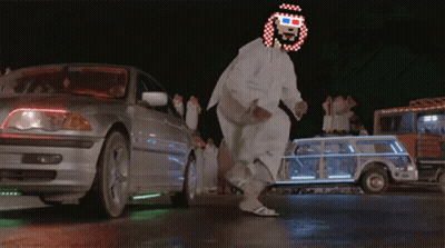 A Man Wearing 3D Glasses Is Dancing In A Parking Lot GIF