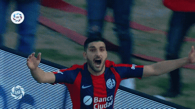 A Man Wearing A Banco Ciudad Jersey Celebrates A Goal GIF