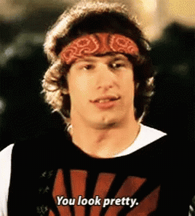 A Man Wearing A Bandana And A Shirt That Says You Look Pretty . GIF