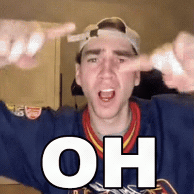 A Man Wearing A Baseball Cap And A Blue Sweater With The Word Oh On It GIF